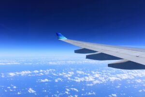 Plane flying above the clouds